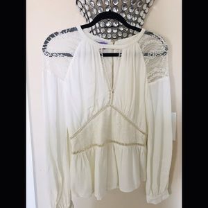 Cream colored long sleeve lace Bebe blouse